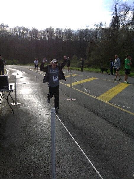 Drew crosses the finish line of his first 5K during the annual Brenda Ladun Conquer Cancer Run.