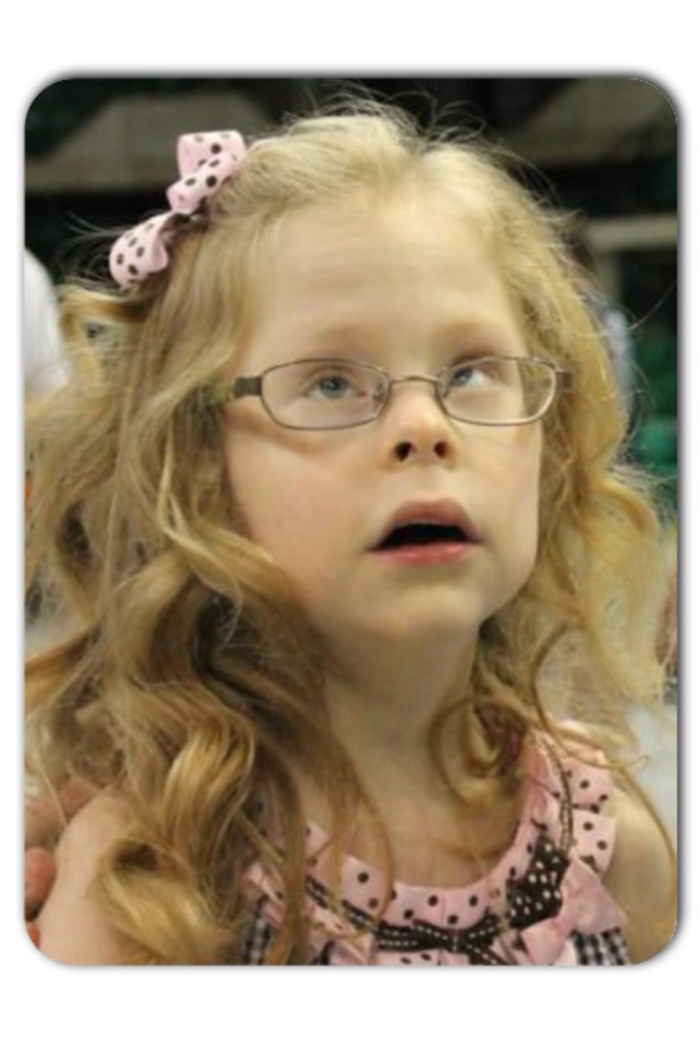 Emily’s parents carried her to UAB this year for the 2013 NICU reunion to reconnect with doctors and nurses who took care of Emily seven years when life was touch and go.