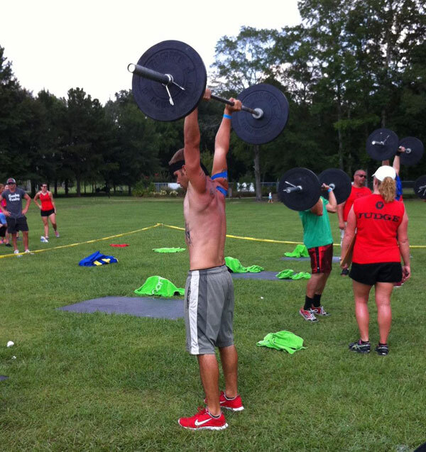 Daniel pushes the weight during competition in the Alabaster Dirty South Games. Daniel and his team of four brought home the silver. 