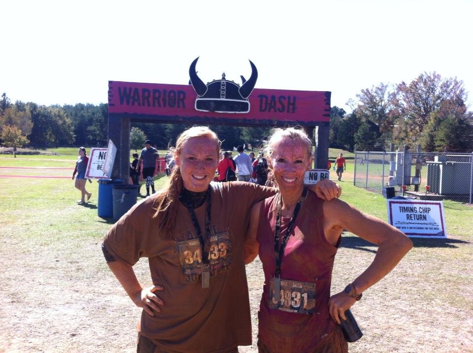 After a successful morning in the mud, Morgan and I celebrate the achievement of another exciting run. 