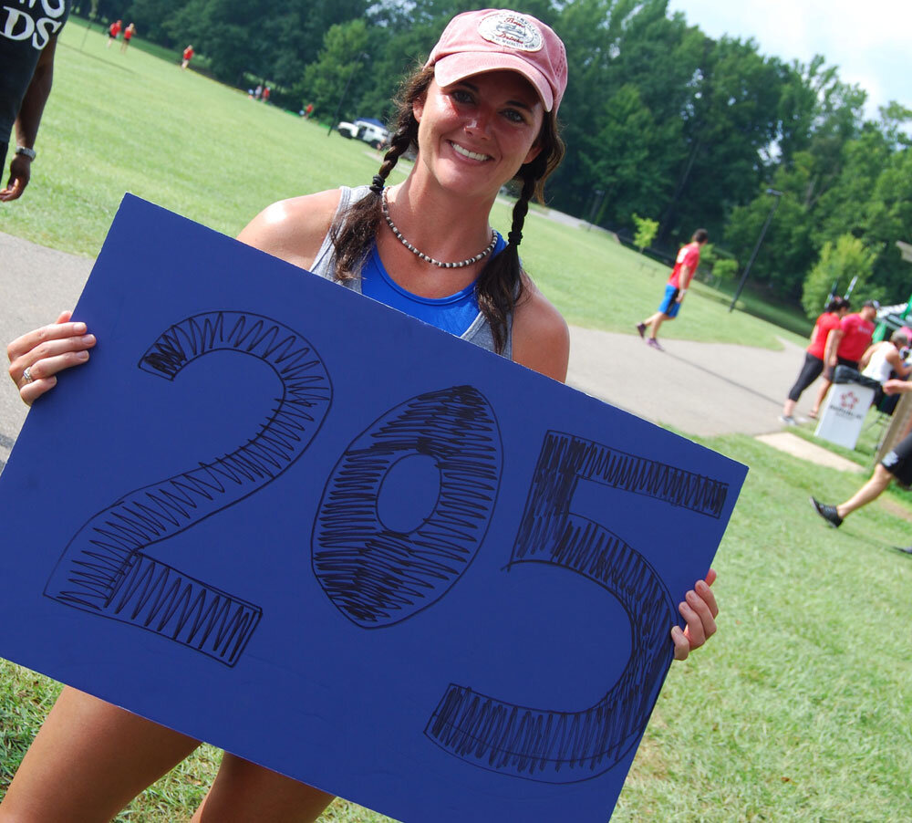 Stephanie is proud to show off the CrossFit team she represents at the Dirty South Games 