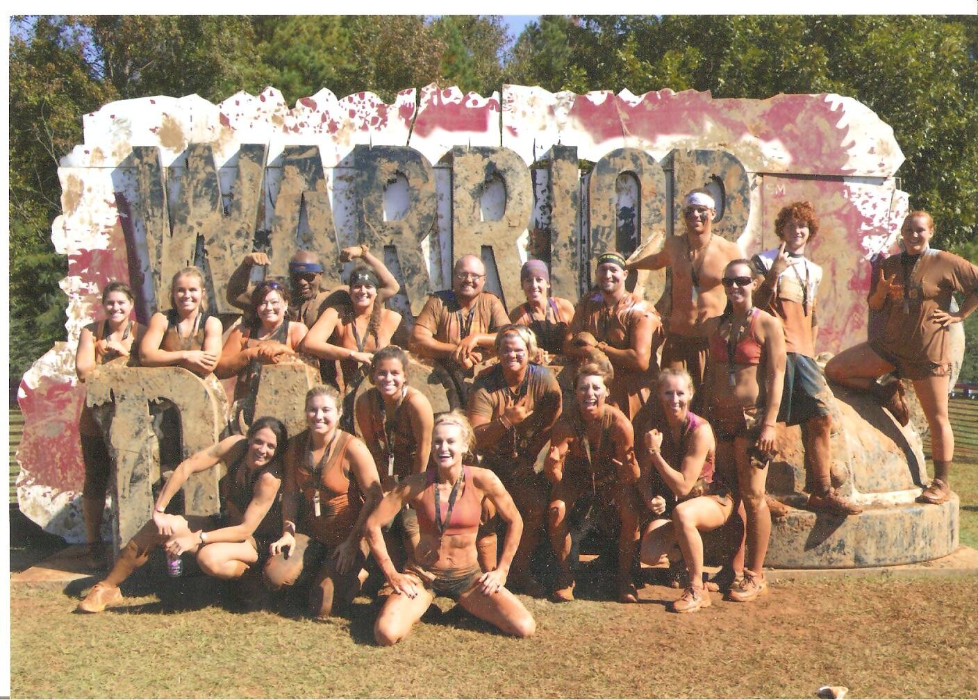 My daughter Morgan, my son Brett, and I join a group of friends from our CrossFit 205 group who also conquered the Warrior Dash for a victory photo. 