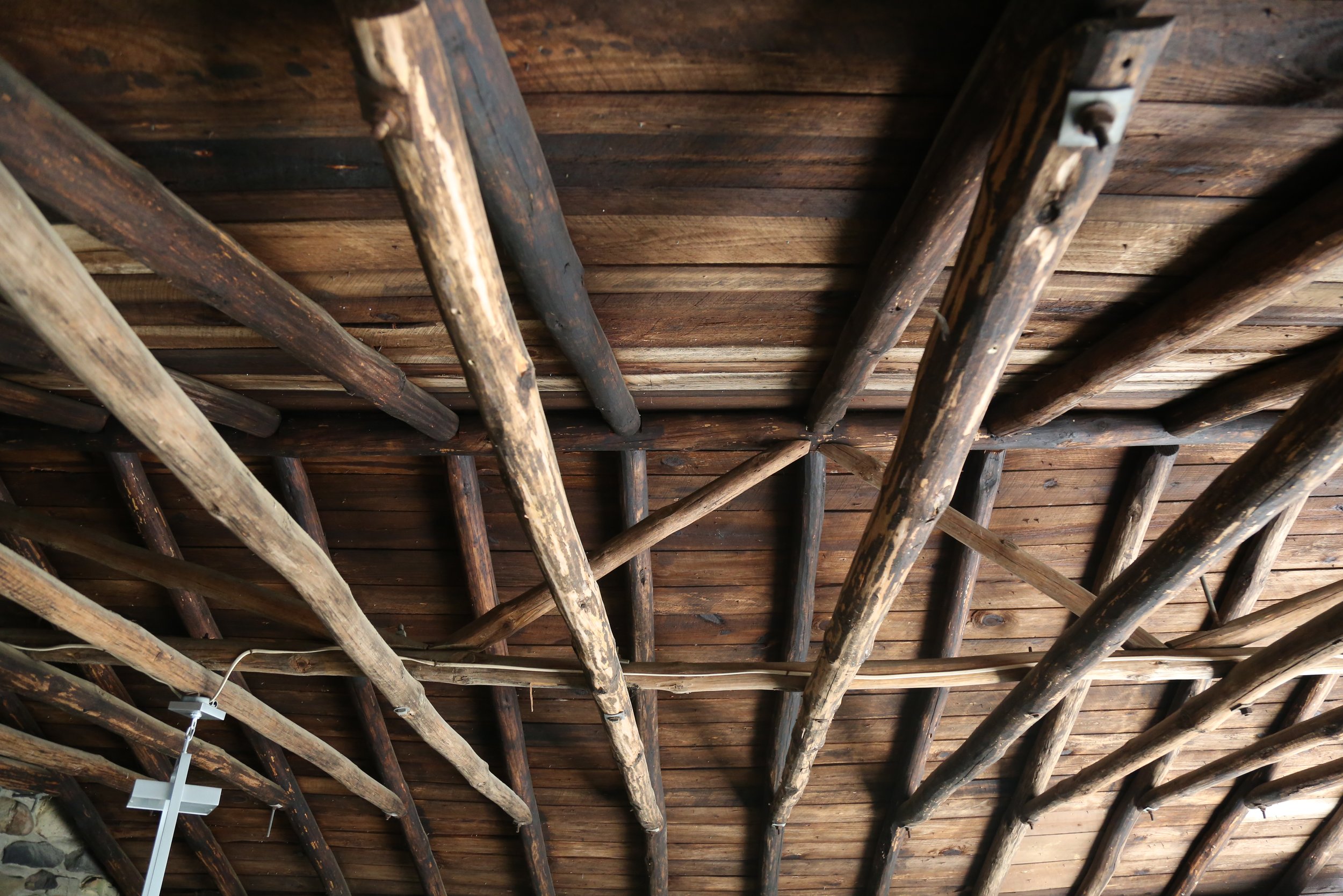   (Above) Treated timbers cut by Grady from the nearby woods.  